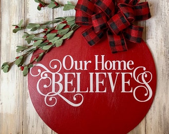 A variety of Christmas door hangers