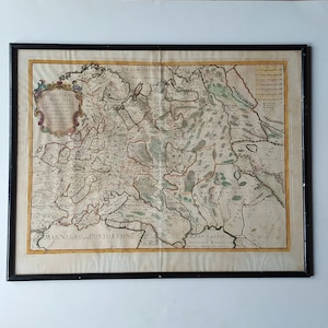 Puede incluir: Un mapa antiguo de la región del Mar Negro, enmarcado en negro, con un título en latín y una clave en la esquina superior derecha. El mapa es detallado y muestra la costa, los ríos y las montañas de la región.