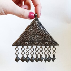 Antique ethnic folk art embossed pendant / necklace / traditional jewelry / relief / repousse