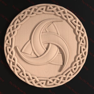 May include: A wooden carving of a Celtic knot design with three crescent moons in the center. The carving is circular and has a raised border.
