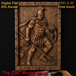 May include: A brown wood-toned relief carving of a Spartan warrior in armor with a helmet, cape, spear, and shield. The rectangular panel features text reading Digital File STL Format and CNC & 3D Print Ready, with The CNC Model Shop at the bottom.