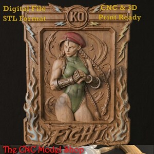 May include: A rectangular wooden relief carving featuring a female character with a red beret and braided hair in a green leotard. The frame includes lightning bolts, flames, and the text Digital File STL Format, KO, and CNC & 3D Print Ready.