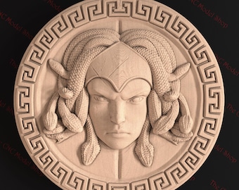 May include: A round, beige-coloured relief sculpture of Medusa, the Greek mythological figure with snakes for hair. The sculpture is framed by a Greek key pattern border.