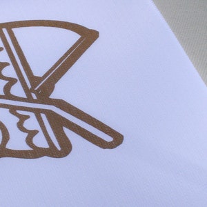 May include: A brown baby carriage silhouette on a white background.
