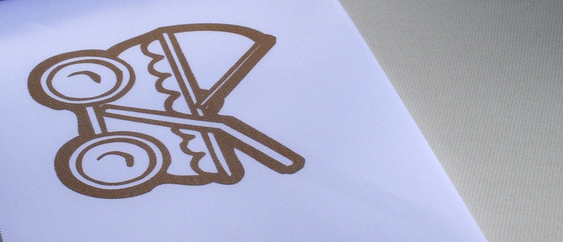 May include: A brown baby carriage silhouette on a white background.
