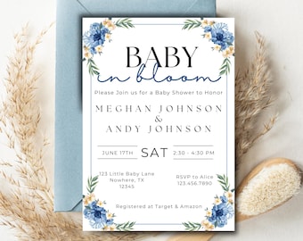 May include: Baby shower invitation with the words "Baby in Bloom" in black and blue script. The invitation includes the names Meghan Johnson & Andy Johnson, date, time, and RSVP information. Floral accents in blue and yellow decorate the corners.