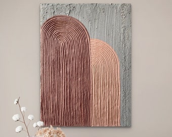 May include: A rectangular wall art piece featuring a textured gray background with two prominent arch shapes. The larger arch is a deep terracotta color, while the smaller overlapping arch is a lighter peach tone, both with vertical ridges.