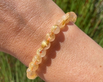 Prachtvolles goldenes Rutilquarz Armband mit 7 mm, 7,5 mm und 10 mm Perlen