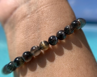 Pulsera de piedra lunar negra estrellada de altísima calidad, cuentas finas de 7 mm