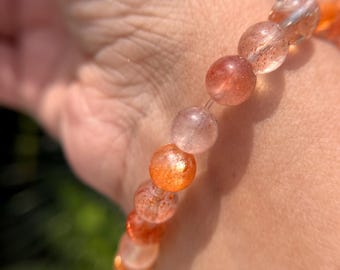 Hoogwaardige armband met glitters van arusha en beryl, kralen van 8 mm. Slechts één.