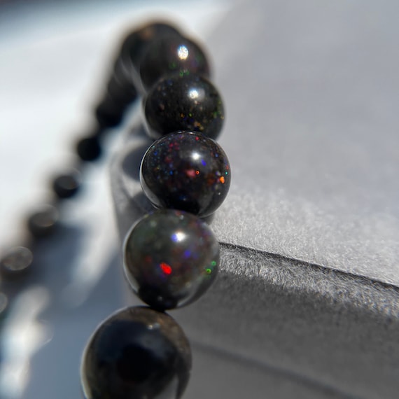 Grey Iridescent Colorful 8.5mm Round Bead Stretch Bracelet Grey Iridescent Colorful 8.5mm Round Bead Stretch Bracelet