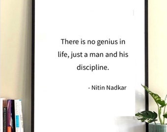 May include: A black framed print with a white background and a quote in black text: "There is no genius in life, just a man and his discipline." - Nitin Nadkar