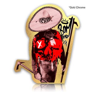 May include: Gold chrome sticker featuring a stylized illustration of a figure in a sombrero and a red skull design on the chest. The figure is holding a tool and the text "BOY BERO" is visible.