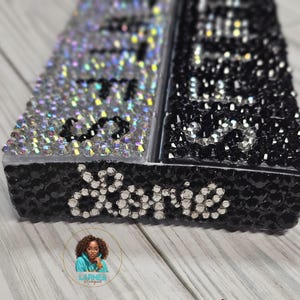 May include: A black and silver tray with rhinestones, featuring the word "Done" in rhinestones.