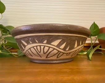 Vintage hand thrown, hand carved ceramic bowl