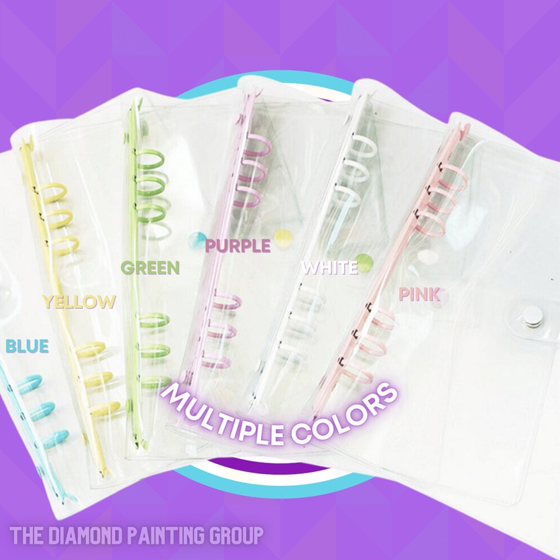 May include: Five clear plastic binders with different colored rings. The rings are yellow, green, purple, white, and pink. The binders have the text "MULTIPLE COLORS" printed on them.
