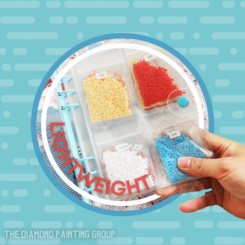 May include: A clear plastic binder with multiple compartments filled with small, colorful beads. The binder has the word "LIGHTWEIGHT" printed on the side. Each compartment is labeled with a number.