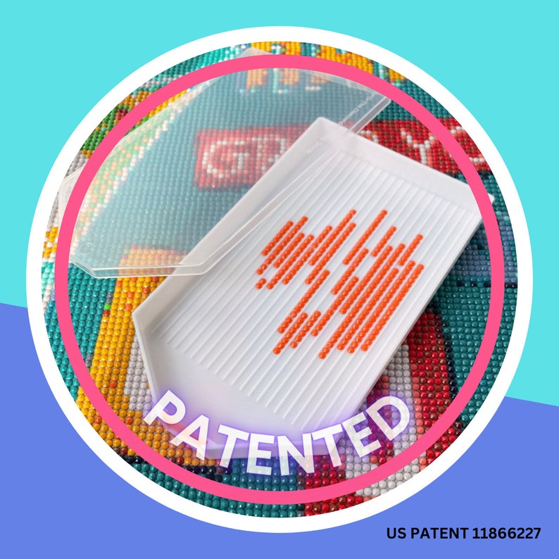 May include: A white plastic diamond painting tray with orange diamond beads arranged in a pattern. A clear plastic lid is on top of the tray. The word "PATENTED" is in white, and the text "US PATENT 11866227" is at the bottom.