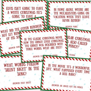 May include: A set of 10 Christmas trivia cards with red and green striped borders. Each card features a Christmas-themed question and answer. The questions are about popular Christmas movies and traditions.