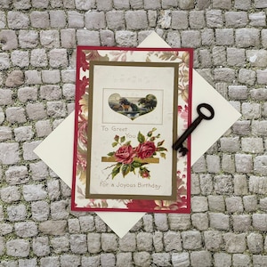 Handmade birthday card using an original vintage postcard, old-fashioned birthday card