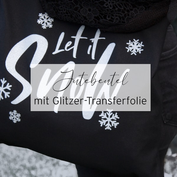 Schwarzer Jutebeutel mit Schriftzug "Let it Snow" –  Winterbeutel