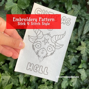 May include: A black and white embroidery pattern of a cute goat with horns and a pentagram on its forehead. The text "Cute as Hell" is below the goat. The pattern is labeled "Embroidery Pattern Stick & Stitch Style" and "@horrorpopdesigns".