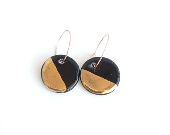Round black ceramic earrings with gold dip, minimalist jewelry