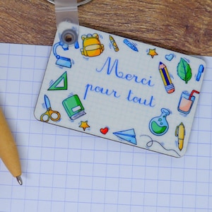 Gepersonaliseerde eindejaarssleutelhanger met notitieboekjes