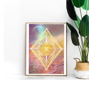 May include: A digital art print featuring a geometric design with a golden diamond shape in the center. The diamond is surrounded by a pink and blue background with a white moon in the upper left corner. The print is framed in a wooden frame.