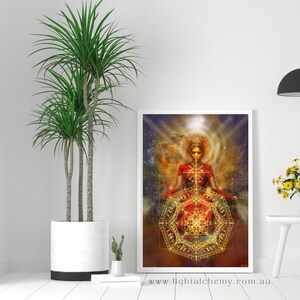 Könnte beinhalten: Ein digitaler Kunstdruck mit einer Frau in einem roten und goldenen Outfit, die vor einem goldenen geometrischen Mandala meditiert. Der Hintergrund ist eine kosmische Szene mit Sternen und Nebeln. Der Text "www.lightalchemy.com.au" befindet sich am unteren Rand des Drucks.