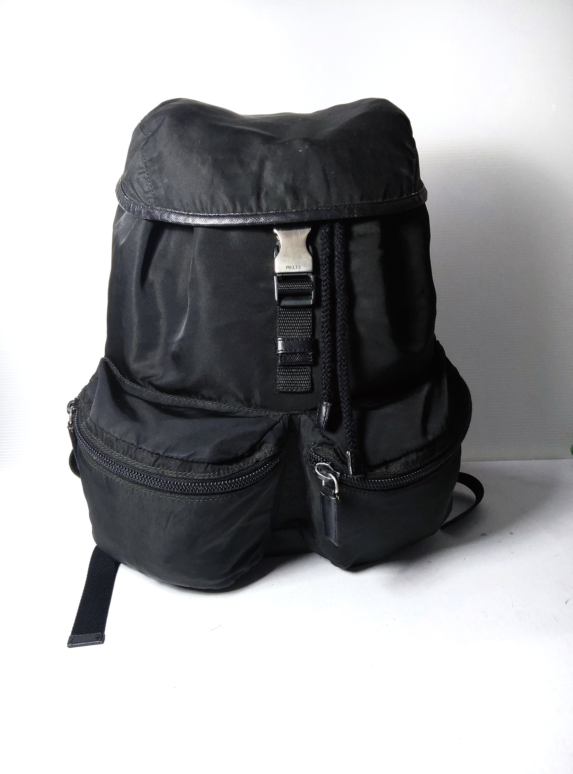 Shop PRADA Small re-nylon backpack (1BZ677_RV44_F0F24_V_OOO,  1BZ677_RV44_F0076_V_OOO, 1BZ677_RV44_F0002_V_OOO) by Snow-O.C | BUYMA