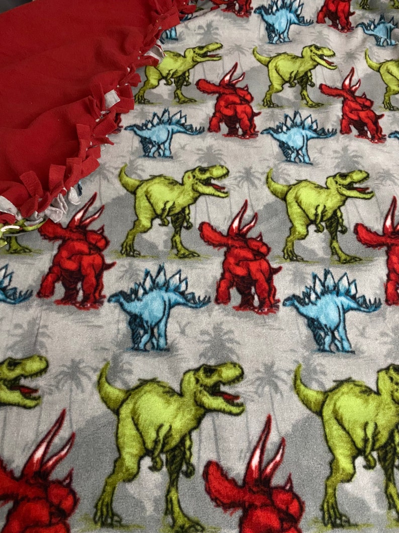 Details about Dinosaurs Handmade Fleece Tie-Blanket Child Size Details about Dinosaurs Handmade Fleece Tie-Blanket Child Size