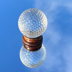 Large Crystal Golf Ball Paperweight on Wooden Stand