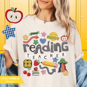 May include: Cream-colored t-shirt with the words "Reading Teacher" in a black and white checkered pattern. The shirt features various colorful patches, including apples, stars, hearts, and smiley faces. The shirt also has the text "Happy" and "Books".