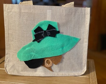 Burlap polyester bag with silhouette image on one side