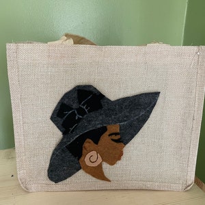 Burlap polyester bag with silhouette image on one side