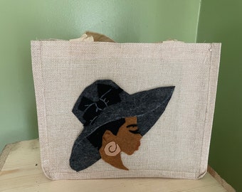 Burlap polyester bag with silhouette image on one side