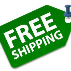 May include: Green tag with white text that says "FREE SHIPPING" with a blue push pin in the upper right corner.