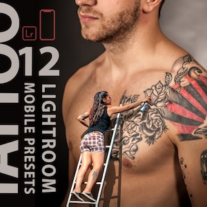 May include: A man with a large tattoo on his shoulder and chest. The tattoo is a combination of black and red ink and features a rose, a sun, and a bird. A woman is standing on a ladder, painting the tattoo with a spray can.