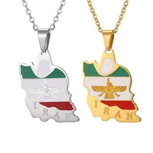 May include: Two necklaces with pendants shaped like the map of Iran. One is silver-toned, the other gold-toned. Each pendant features the Iranian flag colors and a stylized emblem, with the word "IRAN" at the bottom.