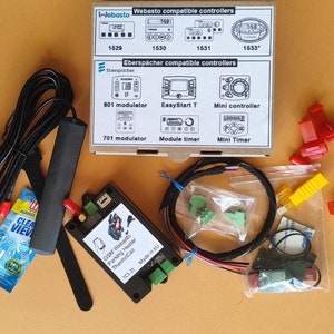 May include: A collection of electronic components, including a black GSM Webasto Parking Heater ThermoCall TCS.2T, wiring, and connectors. The image also shows a box with diagrams of Webasto and Eberspacher compatible controllers.