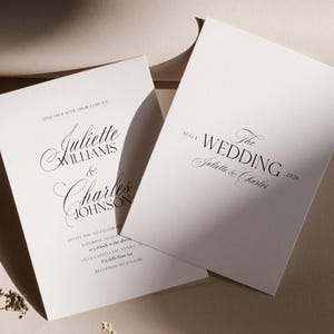 May include: Two white wedding invitation cards with elegant black script. The cards feature the names "Juliette Williams & Charles Johnson" and "The Wedding Juliette & Charles 2026". The invitations include event details.