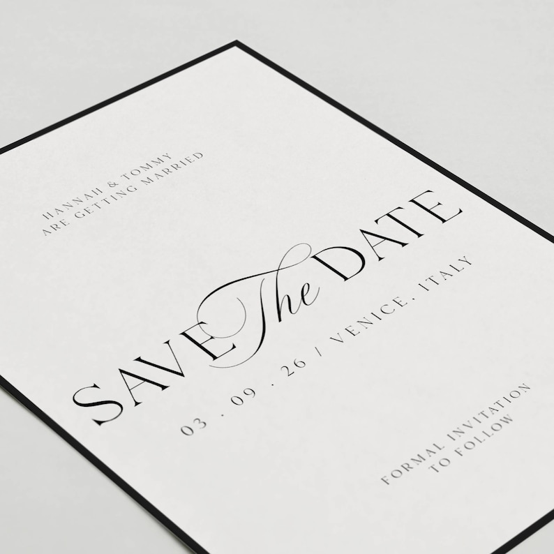 May include: A formal wedding invitation with a black border. The text "SAVE THE DATE" is prominently displayed in elegant black script. Additional text includes the names "HANNAH & TOMMY", the date "03.09.26", and the location "VENICE, ITALY".