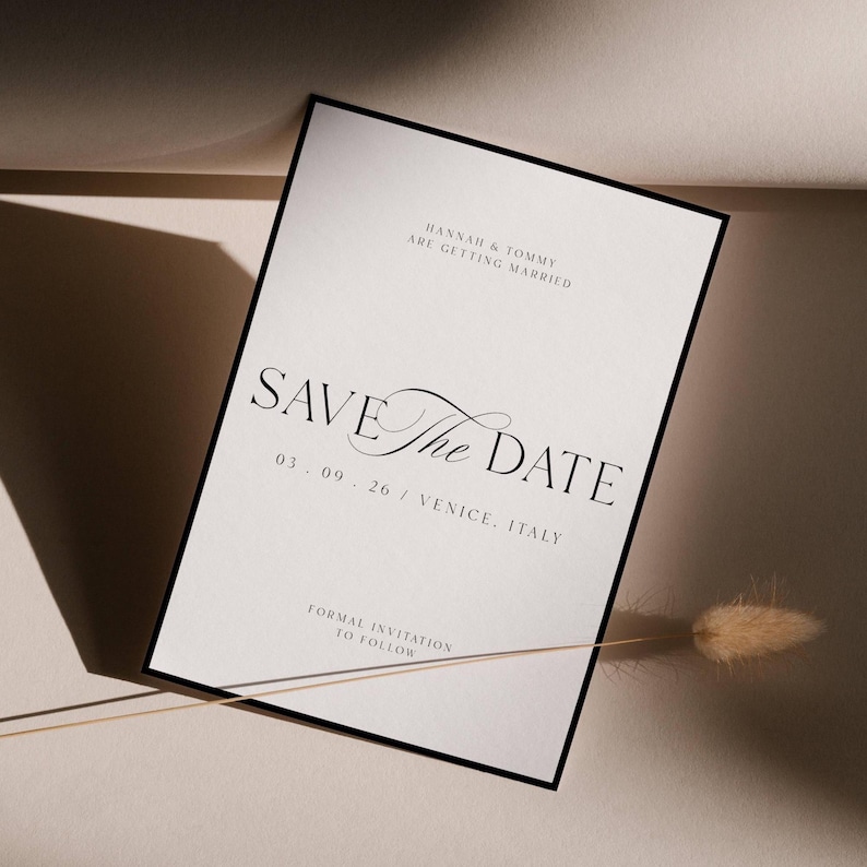 May include: A formal wedding invitation with a black border. The text "SAVE THE DATE" is in elegant script, with the date and location below. The invitation reads "Hannah & Tommy are getting married" and "Formal invitation to follow."