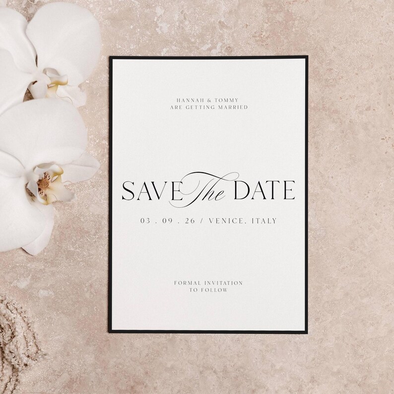 May include: A formal wedding invitation with a black border. The text reads "HANNAH & TOMMY ARE GETTING MARRIED" and "SAVE THE DATE" in elegant script. The date is 03.09.26 in Venice, Italy. White orchids are in the background.
