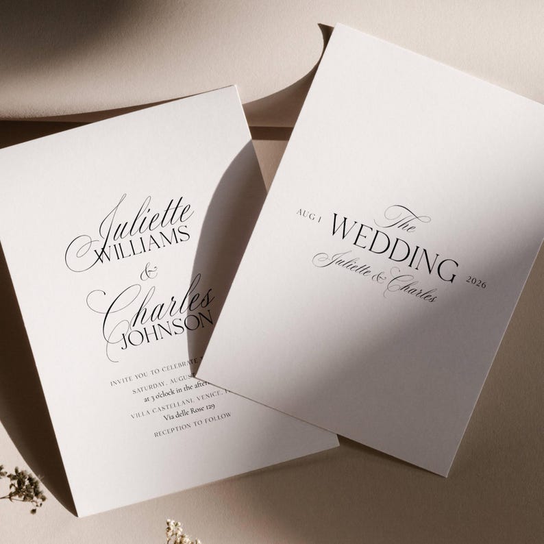 May include: Two white wedding invitations with elegant black script. One invitation reads "Juliette Williams & Charles Johnson." The other says "The Wedding Juliette & Charles 2026." Additional text includes date, time, and location.