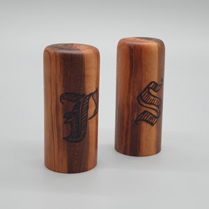 Salt and pepper shakers made from Goncalo Alves, each mill is hand turned on a lathe and is a unique one off piece of wood art.