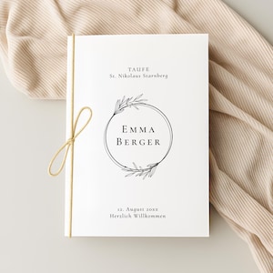 May include: A white invitation with the text "TAUFE" and "St. Nikolaus Starnberg". The invitation features a circular floral design with the name "EMMA BERGER". The date "12. August 20xx" and "Herzlich Willkommen" are also included.