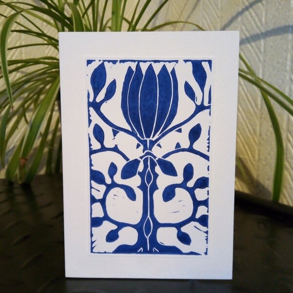 Blue flower and leaves. A hand printed blank lino cut card from an original design. Free postage.