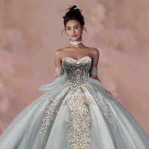 Luxury Blue Quinceanera Ball Gown Evening Gown with off shoulder sleeves and crystal beaded bodice